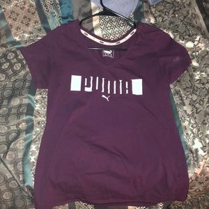 A burgundy puma shirt